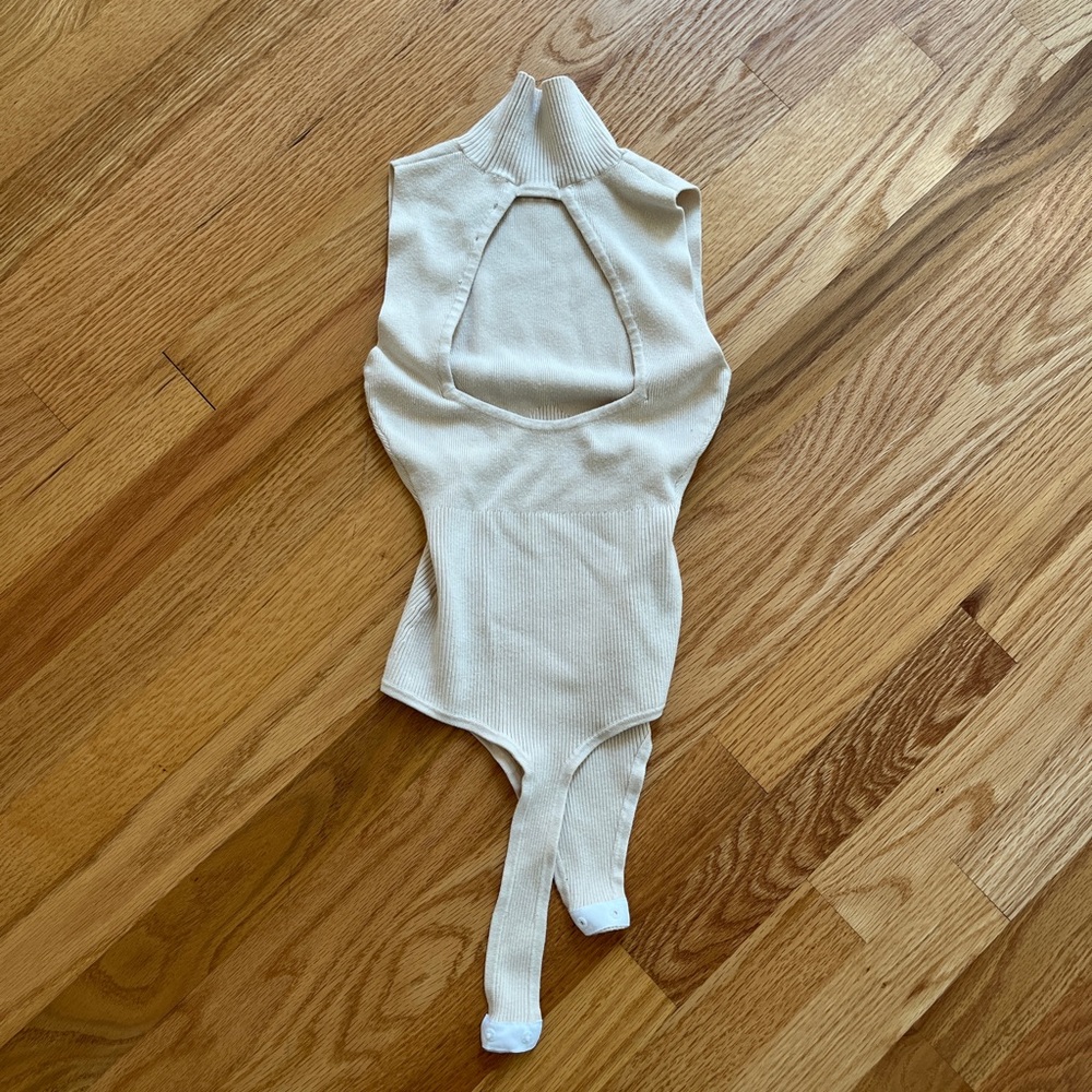 Sexy Beige turtleneck bodysuit with cut out back